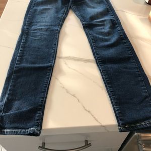 Maternity jeans. Small tear around waist